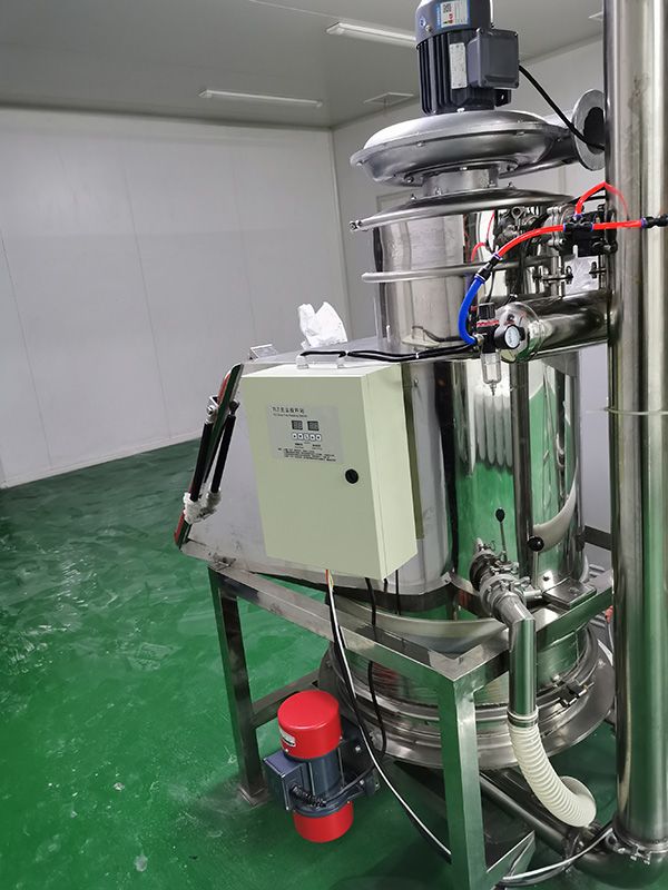 小袋手（shǒu）動投（tóu）料+真（zhēn）空（kōng）上料機